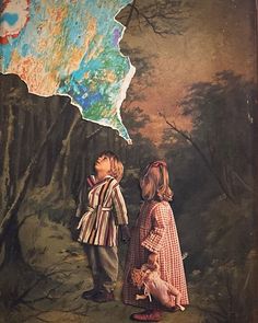 two children looking up at a painting on the wall