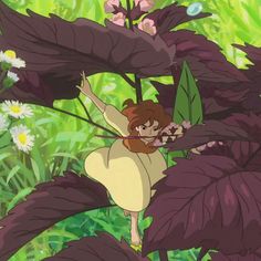 a girl is standing in the middle of some plants and flowers with her arms outstretched