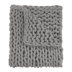 a gray knitted blanket on a white background