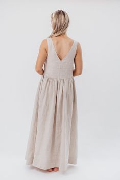 Introducing this Eleonie Maxi Dress, the perfect combination of elegance and comfort! this gorgeous gown is crafted from premium linen that will keep you cool all summer long. It features a relaxed bodice, in-seam pockets, and a full, flowy skirt that adds charm and comfort. This is a dress you can wear any day of the week! Available in two colorways. FIT: Runs true to size - relaxed fit. MATERIAL: 100% Linen. GARMENT DETAILS: Lightweight linen maxi dress with V-neckline, sleeveless silhouette, and a pieced bodice with room for larger chests. Features a full, gathered skirt and in-seam pockets. SIZE GUIDE: XS (0-2) / S (2-4) / M (6-8) / L (10-12) / XL (14-16) MODEL DETAILS: MISSES Mackenzie - Size S Heather - Size S Bust 34" 34" Waist 27.5" 27.5" Hips 40.5" 37.5" Height 5'7" 5'7" Garment Details, Linen Maxi Dress, Gathered Skirt, Flowy Skirt, Gorgeous Gowns, Keep Your Cool, A Dress, Size Guide, Bodice