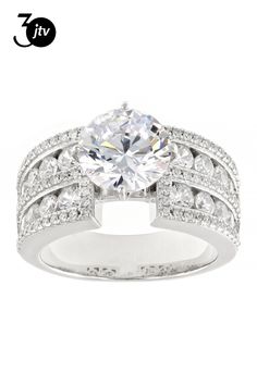 Bella Luce�� white diamond simulant 6.53ctw round, platinum over sterling silver ring. Measures approximately 0.88" L x 0.38" W and is not sizable. The diamond equivalent weight is 3.95ctw. Diamond Simulant, White Diamond, Sterling Silver Ring, Silver Ring, Sterling Silver Rings, Cubic Zirconia, Platinum, Silver Rings, Sterling Silver