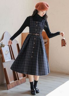 Vintage inspired pinafore midi dress in a tweed knit plaid pattern. Features a square neckline for easy layering with your favorite blouse or sweater. Button up front with belt loops at the waist and side pockets. Belt included. S: 28" waist, 41" lengthM: 29.5" waist, 41" lengthL: 31" waist, 41" length Dark Cottagecore Fashion, Fashion Terminology, Knit Plaid, Cottagecore Outfits, Cottagecore Fashion, Beautiful Dresses Short, Stylish Dress Book, Dress Out, Pinafore Dress