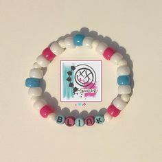 kandi bracelet : white , pink , blue , bead , beads , scene , emo , scenemo , album , blink182  : #kandi #kandidiy #kandicrafts #kandibracelet Emo Bracelet Ideas, Scene Kandi Bracelets, Blink 182 Bracelet, Band Kandi, Blink Concert, Emo Kandi, Blue Kandi, Album Bracelets, Scene Bracelets