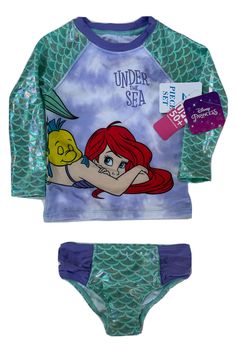 New Disney’s The Little Mermaid, Ariel Rash Guard & Bikini Bottoms Swimsuit UPF 50+￼ SIZE: 2 Toddler From Disney’s Princess collection Features: Ariel wrap around with Flounder asleep on her back “UNDER THE SEA” Title Long sleeves in green that look like scales Bikini bottoms with hygienic liner Shop with confidence, 100% authentic designer brand merchandise guaranteed, great prices and returns accepted; if returned it must have all tags & hygienic liner still intact. Your refund all be your pur Playful Fitted Sets With Character Print, Disney Character Print Playwear Sets, Blue Character Print Swimwear For The Beach, Blue Cartoon Print Swimwear For Play, Multicolor Character Print Swimwear For Play, Playful Character Print Swimwear, Fitted Blue Swimwear With Character Print, Multicolor Character Print Swimwear For Beach, Playful Fitted Cartoon Print Swimwear