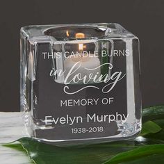 this candle burns in loving memory of evelyn murphy, inscribed with the words