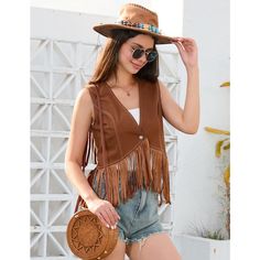 This vintage 70s vest exudes a retro vibe with its timeless design and soft texture, perfect for adding a touch of bohemian flair to any outfit. Trendy Brown Vest For Summer, Trendy Brown Summer Vest, Sleeveless Brown Vest For Festivals, Brown Sleeveless Fringe Vest, Brown Bohemian Vest With Fringe, Bohemian Brown Vest With Fringe, Brown Bohemian Fringe Vest, Bohemian Brown Fringe Vest, Western Style Sleeveless Vest For Spring