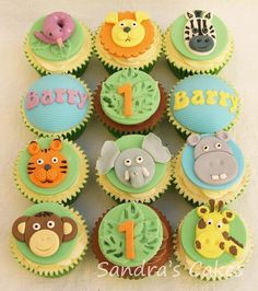 cupcakes decorated with different animals and numbers