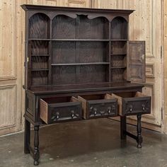 an old wooden desk with two drawers