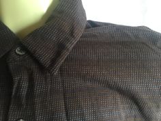 "Brown long sleeved top by DKNY. 100% Cotton weave dark brown blouse with rows of subtle tan and light blue pin dots. Button up front, collared and tailored looking. Says size S, but measures 20\" across middle so I would think it would fit a medium. Very soft material, super comfy! Please take a look at my storefront at: https://www.etsy.com/shop/FabFinds42?ref=seller-platform-mcnav I have a wide selection of one-of-a-kind items, from clothing and toys to home decor and gift items, and I add ne Brown Long Sleeve Cotton Blouse, Brown Cotton Long Sleeve Blouse, Long Sleeve Brown Cotton Blouse, Long Sleeve Cotton Blouse In Brown, Brown Long Sleeve Flannel Shirt, Fitted Brown Winter Blouse, Fitted Brown Blouse For Winter, Winter Brown Cotton Blouse, Dark Brown Blouse