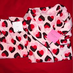 Kate Spade Pajama Set Womens Large Pink Double Hearts Valentine's Day 2 Piece Set/ Nwt. New With Tags Kate Spade New York Women's Long Sleeve 2 Piece Pajama Pant Set 90% Polyester 10% Elastane Jersey Knit Fabric Solid Pink With Black Trim Double Heart Logo Print Pink Kate Sade Logo Buttons Notched Collar 1 Chest Pocket Elastic Waist Pant Non-Cuffed Hem Size: Large New // Never Worn Before Please Refer To Picture And Ask Any Questions. Pit To Pit: 21" Shoulder Down: 23" Arm Length: 23" Rise: 12.5 Pink Sleepwear For Valentine's Day, Pink Valentine's Day Sleepwear, Valentine's Day Heart Print Sleepwear, Pink Sleepwear For Valentine's Day Pajama Party, Valentine's Day Sleepwear With Heart Print For Sleepover, Valentine's Day Heart Print Sleepwear For Sleepover, Red Heart Print Sleepwear For Pajama Party, Red Heart Print Sleepwear For Valentine's Day, Kate Spade Pajamas