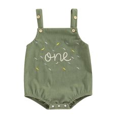 a green one piece bodysuit with sprinkles and the word, one