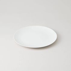 a white plate sitting on top of a table