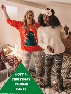 two women standing on top of a bed in pajamas and christmas sweaters with the words host a christmas pajama party