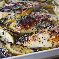 chicken with lemon and rosemary in a pan