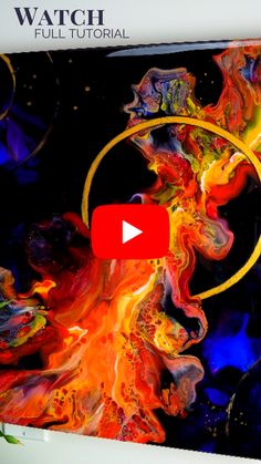 an abstract painting is featured in the video, which shows it's colorful colors