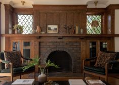 a living room filled with furniture and a fire place