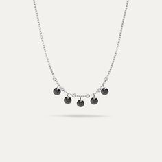 Elevate your style with our 14k Gold Onyx Necklace, featuring five tiny 3mm black stones on a 16.5" chain. Its adjustable 1.20" extender and secure spring-ring clasp ensure a perfect fit. This dainty necklace is ideal for enhancing any formal attire.PRODUCT DETAILSMaterial: 14K Solid Gold Choice of Gold Color: Yellow Gold, Rose Gold, White GoldNecklace Length: 16.5 inches (extension chain 1.2 inches)Onyx diametes: 3 mmClosure: Spring ringChain style: Cable Elegant Black Necklace With Cable Chain, Minimalist Black Necklace With Satellite Chain, Sterling Silver Black Necklace With Cable Chain, Black Sterling Silver Necklace With Cable Chain, Black Sterling Silver Necklace With Delicate Chain, Everyday Black Necklace With Cable Chain, Elegant Black Charm Necklace With Adjustable Chain, Black Stones, Onyx Necklace