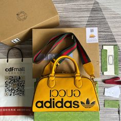 gg x Adidas Mini Duffle Bag Yellow For Women Gucci Adds, Gg Collection, Gucci Collection, Mini Duffle Bag, Red Web, Gg Monogram, Gucci Monogram, Adidas Trefoil, Sportswear Brand