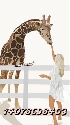 a woman feeding a giraffe over a white fence