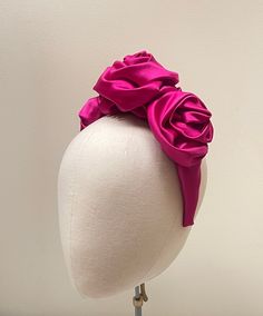 This beautiful high end headband has been carefully handmade. The padded band has been covered with duchess  silk fabric and adorned with a double rosette corsage which has been stitched securely to the headband. It is also finished with a tiny comb to fix securely.  This would make a perfect accessory for a wedding or a special occasion or a treat for someone special or for yourself.  Print or placement may vary slightly as this is a bespoke handmade item. Custom Orders - If you like this style Pink Satin Bow Headband For Party, Headband Fascinator, Magenta Rose, Rose Headband, Hair Accessories Headbands, Silk Satin, Silk Fabric, Fascinator, Pink Roses