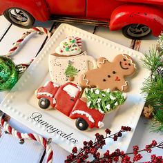 a plate that has some cookies on top of it and decorations around the rims