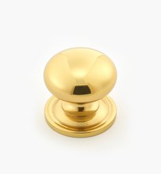 an image of a golden knob on a white background