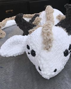 a stuffed animal is laying on the floor