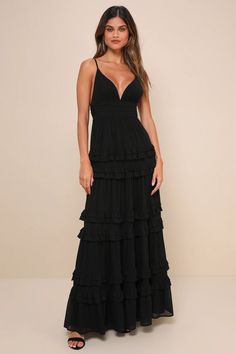 Simple yet stunning, there are so many elements of the Lulus Lavish Perfection Black Ruffled Tiered Maxi Dress that you'll love! This dress is composed of lightweight woven chiffon that shapes a lightly gathered bodice, a flirty V-neckline, and adjustable spaghetti straps. The high, pleated banded waist tops an elegant A-line maxi skirt adorned with tiers of ruffled detailing throughout for an ultra-femme finish. Hidden back zipper/clasp. Elegant Ruffled Straps Maxi Dress For Date Night, Flowy Tiered Maxi Dress For Date Night, Flowy Party Dress With Ruffled Straps, Flirty Maxi Dress With Ruffled Straps For Evening, Flirty Evening Maxi Dress With Ruffled Straps, Tiered Maxi Dress With Ruffle Hem For Date Night, Tiered Ruffle Hem Maxi Dress For Date Night, Chic Tiered Maxi Dress For Party, Flowy Tiered Maxi Dress For Party