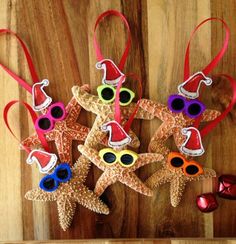 a group of starfish ornaments on top of a wooden table