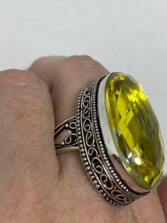 Large brilliant amber antique glass Ornate German Silver NOT 925 Vintage ring, does not tarnish Size 7 My jeweler will re size for a $20 fee All rings are shipped free I. The US in a nice gift box. Check out our over a THOUSAND great reviews Engraving is $4 per letter and is not always perfect depending on the piece. It can take a few days if the jeweler is busy. This is payable to Paypal Judithsltd@gmail.com Classic Yellow Faceted Rings, Vintage Faceted Rings As Gift, Vintage Faceted Rings For Gift, Yellow Oval Crystal Ring Gift, Yellow Rings Stamped 925 For Gift, Yellow 925 Stamped Rings As A Gift, Antique Yellow Rings For Collectors, Antique Yellow Collectible Ring, Yellow Faceted Ring For Gift