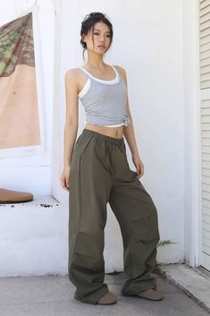 Item Type: Bottoms. Material: 85% Cotton. 10% Polyester. 5% SpandexPattern: PlainColor: Army green. Black. GraySize: S.M.L Size (CM): Waist Hip Thigh Length S 60 112 70 101 M 64 116 72 102 L 68 120 74 103 Green Cargo Style Wide-leg Parachute Pants, Trendy Baggy Green Wide Leg Pants, Green Cargo Pants For Summer Streetwear, Trendy Green Baggy Wide Leg Pants, Green Spring Streetwear Bottoms, Olive High-waisted Pants For Spring, Casual Green Wide Leg Pants For Spring, Green Baggy Parachute Pants For Spring, Trendy Green Parachute Pants With Elastic Waistband