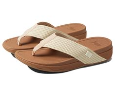 FitFlop Surfa Slip-on Sandals - Women's Sandals : Cream Mix : Click to learn more about the biomechanically engineered, ergonomic FitFlop® footbed. for the women's FitFlop sizing guide. OPTIMAL FLIP-FLOPS: The FitFlop Surfa and sandy beaches are a match made in heaven, featuring a soft fabric upper in a thong sandal silhouette and our sophisticated Microwobbleboard technology. SLIP-ON STYLE: Simple and modern flip flops feature an easy slip-on construction along with a toe post and an open back Ergonomic Sandals For Summer Beach, Ergonomic Sandals For Beach In Summer, Fit Flops, Beach Sandals Flip Flops, A Match Made In Heaven, Slip On Sandals, Match Made In Heaven, Made In Heaven, Match Making