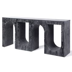 a black wooden bench with an unusual design on the front and back ends, made out of wood