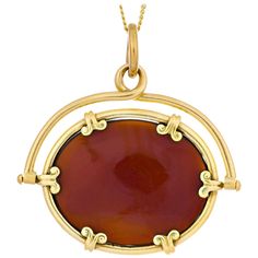 Early 1900's carnelian 14k yellow gold watch fob pendant necklace. Oval center carnelian in 14k yellow gold on an 16 inch chain. 1 oval reddish orange cabochon carnelian 14k yellow gold Stamped: 14k 9.0 grams Top to bottom: 33.6mm or 1 1/3 Inch Width: 33.8mm or 1/3 Inch Depth or thickness: 4.5mm Chain: 16 Inches Remodel Inspiration, Reddish Orange, Amber Bracelet, Christmas Photo, Oval Pendant, Unique Pendant, Diamond Pendant Necklace, Photo Albums, Drop Necklace