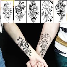 two people holding hands with tattoos on their arms and one is showing the same tattoo designs