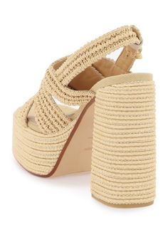 The Fulvia sandals by Castañer are made of woven raffia with criss-crossed straps, an adjustable ankle strap, leather insole and rubber sole. Raffia Sandals, Before Midnight, Woven Raffia, Beach Wear Dresses, Best Bags, Sandals For Sale, Flat Espadrilles, Versace Men, Pump Sandals