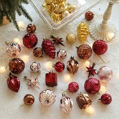 christmas ornaments and lights on a table