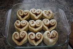 heart shaped pastries in a baking dish ready to be baked