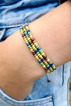 Boho rainbow beaded accessory for summer Bohemian Multicolor Beaded Bracelets With Waxed Cord, Bohemian Rainbow Beaded Bracelets With Sliding Knot, Multicolor Beaded Bracelets With Adjustable Waxed Cord, Multicolor Beaded Bracelets With Adjustable Cord, Multicolor Adjustable Beaded Bracelets, Adjustable Rainbow Heishi Beads Bracelet, Casual Multicolor Beaded Bracelets With Waxed Cord, Seed Beads Bracelet, Wax Cord Bracelet