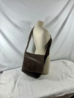 "Measurements are 10\"5 wide, 10\" high, 3\"5 deep with one 41\" shoulder strap with a 20\" drop.  This bag is awesome with one main compartment, lined in brown fabric  interior, silver tone hardware and a top zipper closure.  The leather is thick and strong with no tears and bag has some odor as is vintage. This lovely bag is spacious with plenty of room and will last you for years to come. 100% genuine leather hand made by SIMON.  I SHIP WORLDWIDE    I want to stress that item is vintage which Vintage Brown Flap Shoulder Bag, Brown Leather Saddle Bag Crossbody, Vintage Brown Flap Bag, Brown Leather Crossbody Saddle Bag, Vintage Brown Crossbody Flap Bag, Vintage Brown Saddle Bag With Detachable Strap, Vintage Brown Flap Satchel, Brown Leather Saddle Bag With Flap And Leather Lining, Brown Saddle Bag With Leather Lining And Flap