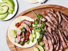 steak with avocado and salsa served on tortillas