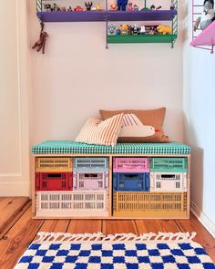 a room with some shelves filled with toys