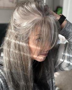 I love seeing how many women are embracing their gray hair and sharing their journeys on social media. As women, we tend to have unrealistic expectations for ourselves, in all areas of our lives, and this carries over into our hair. But, the fact is, pretty much all of us will go gray at some Gray Hair Blonde Highlights, Smokey Hair Color Gray, Gray Blended Hair, Gray Blending Hair Highlights, Hide Gray Hair, Blonde Hair Going Grey, Smokey Hair, Gray Hair Solutions