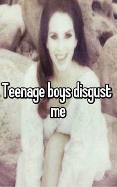 a woman sitting on rocks with the caption teenage boys disgustt me