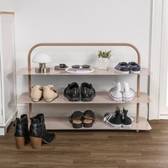 there is a shelf with shoes on it