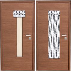 two wooden doors with white and black patterned paper on the front, and one closed