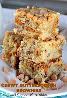 chewy butter cake brownies stacked on top of each other with nuts in the middle