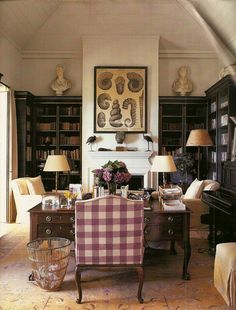 a living room filled with furniture and a piano