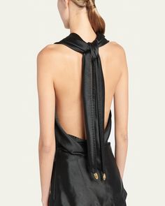 Bottega Veneta fluid twill top featuring draping and goldtone conch shell embellished neck ties    Cowl halter neckline; selftie back    Sleeveless    Relaxed fit    Polyester/viscose/acetate    Made in Italy Elegant Tie-back Halter Top For Night Out, Halter Neck Top With Tie Back For Evening, Elegant Evening Halter Top With Tie Back, Elegant Tie Back Halter Top For Evening, Elegant Halter Neck Top With Tie Back, Elegant Fitted Silk Halter Top, Elegant Silk Halter Top For Formal Occasions, Elegant Silk Halter Top For Formal Events, Elegant Sleeveless Tie-back Halter Top