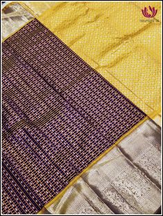 Venkatagiri silk/pattu Saree is woven in Venkatagiri of Nellor district in the Indian State of Andra pradesh. It was registered as one of the geographical indications from Andhra Pradesh. Venkatagiri sarees are known for their fine weaving,fine quality and workmanship. This beautiful rich silk saree in deep violet with small checks in copper zari and buttas in silk zari all over the body. The contrast yellow pallu and border with silver zari compliments the saree. The yellow blouse piece matches Traditional Silk Mark Certified Dupatta For Festivals, Festive Yellow Dupatta With Weaving Work, Yellow Raw Silk Dupatta With Weaving Work, Yellow Dupatta With Weaving Work For Festivals, Silk Mark Certified Tissue Silk Dupatta For Festivals, Yellow Dupatta With Weaving Work For Diwali, Yellow Traditional Wear With Weaving For Diwali, Diwali Yellow Traditional Wear With Weaving Work, Festival Paithani Silk Dupatta With Silk Mark Certification